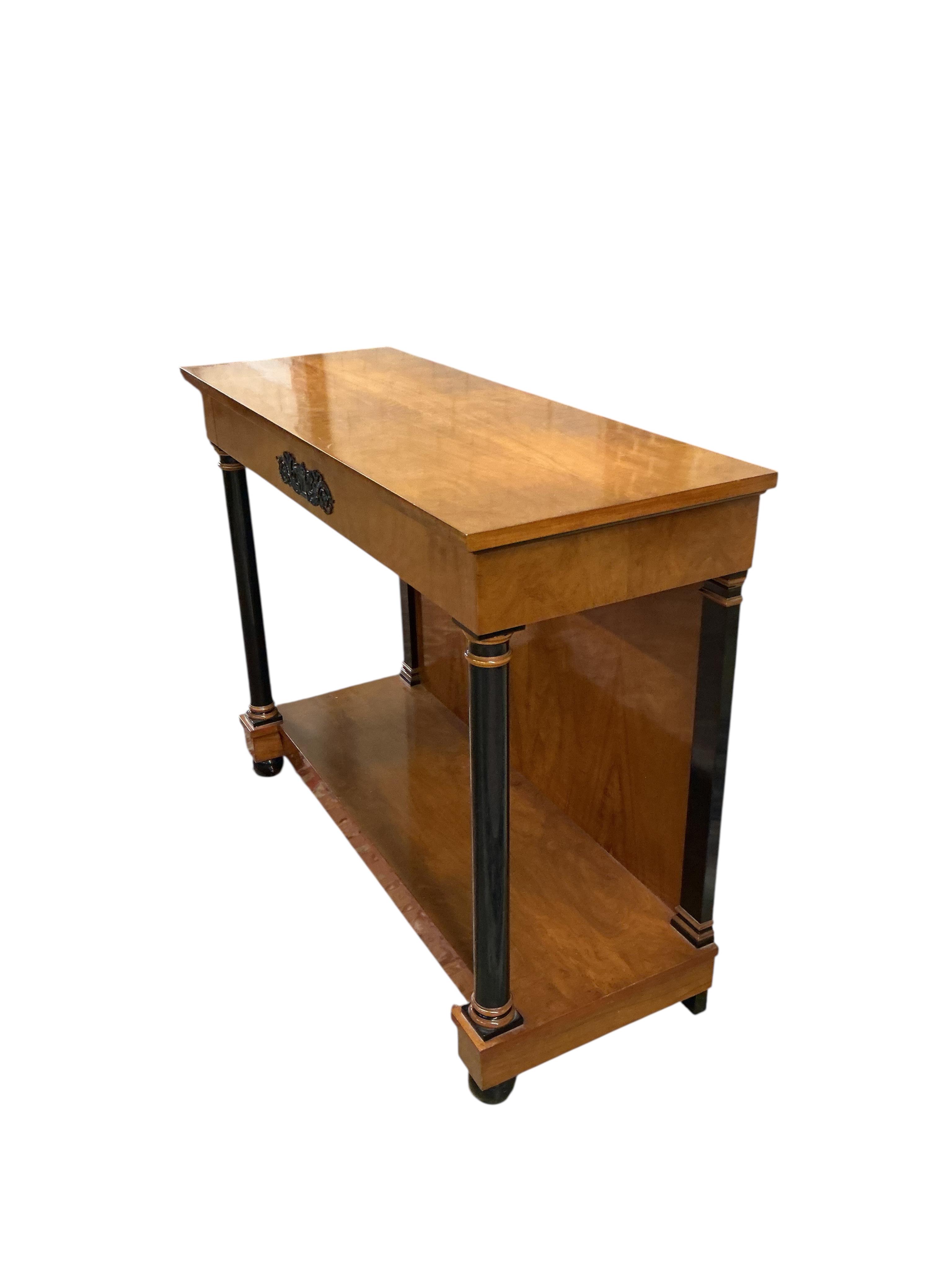 A pair of Biedermeier style cherry two tier console tables, with frieze drawers, width 110cm, depth 42cm, height 86cm